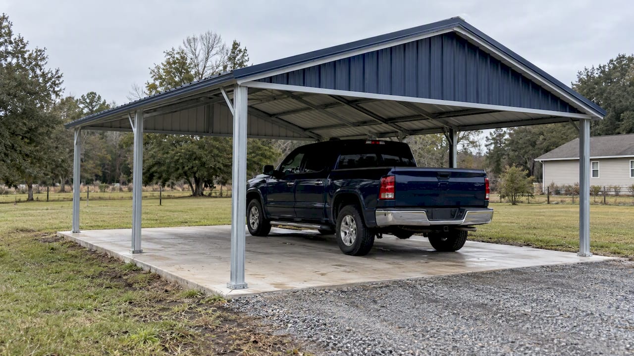 Custom metal carport on concrete foundation