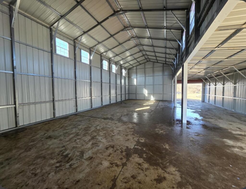 Long interior bay of a steel building during construction