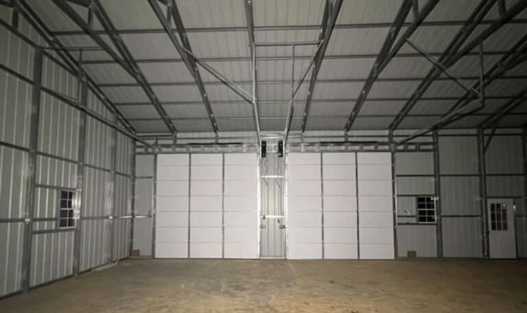 Interior steel framing and wall panels of a new metal building