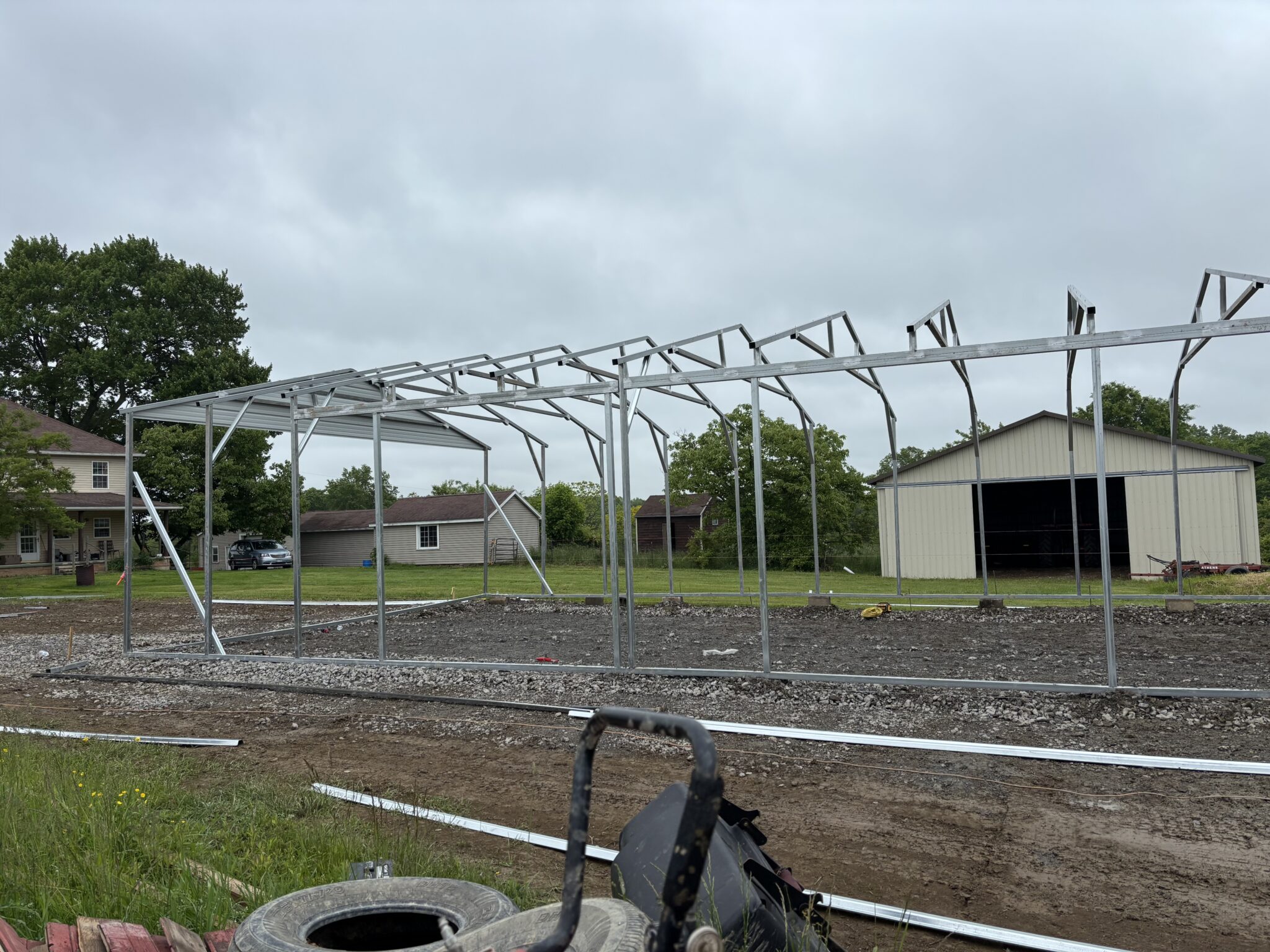 Steel building frame erected on a prepared site