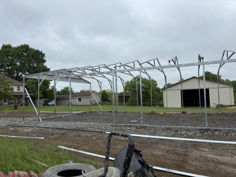 Steel building frame erected on a prepared site